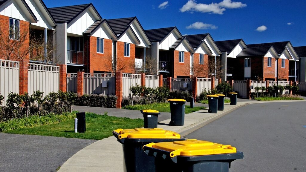 Modern homes lining a quiet suburban street in Christchurch